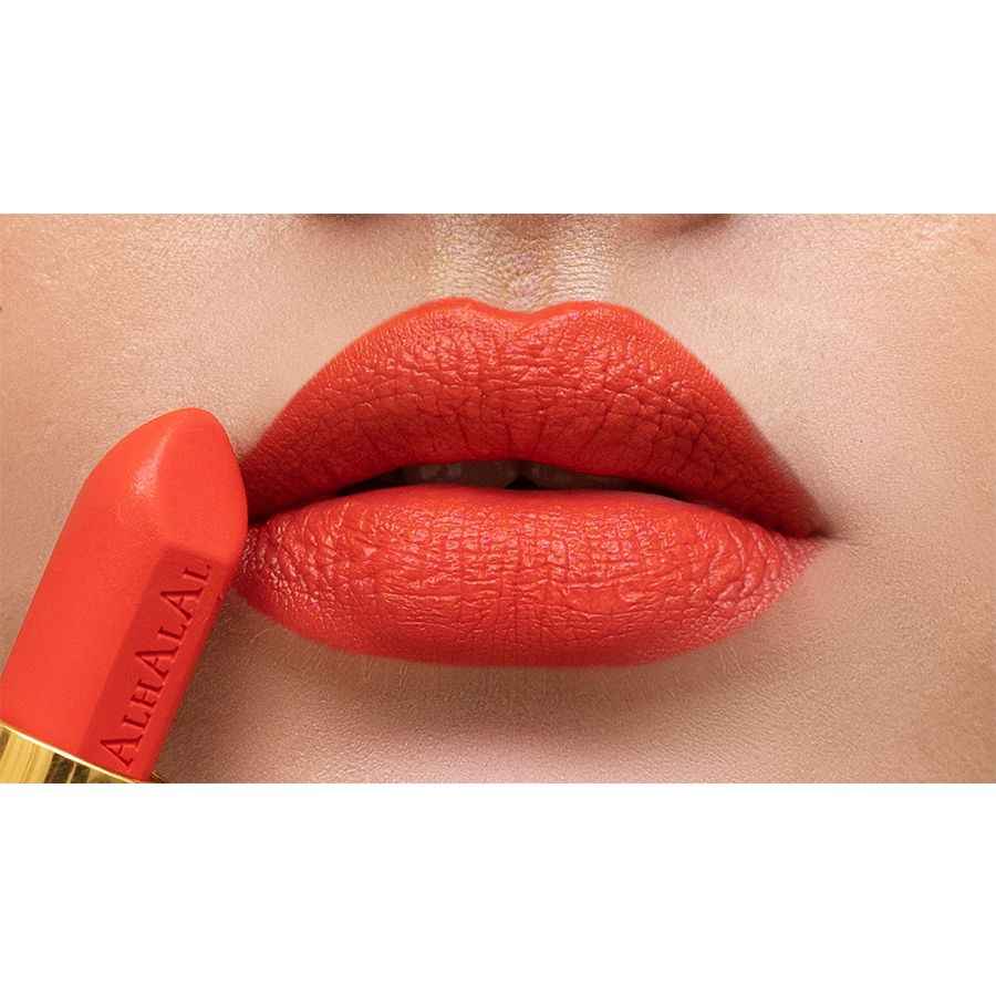 Alhalal MILANO LIPSTICK Samtlippenstëft an enger lieweger oranger Faarf op volle Lëpsen